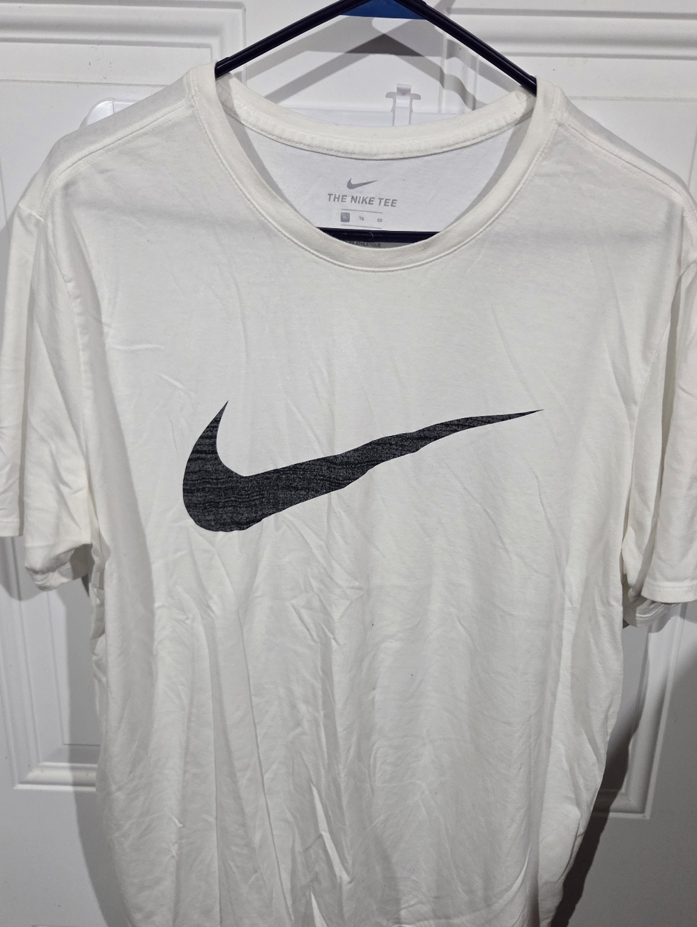 Nike Men’s White Short Sleeve Tee with Black Swoosh Graphic